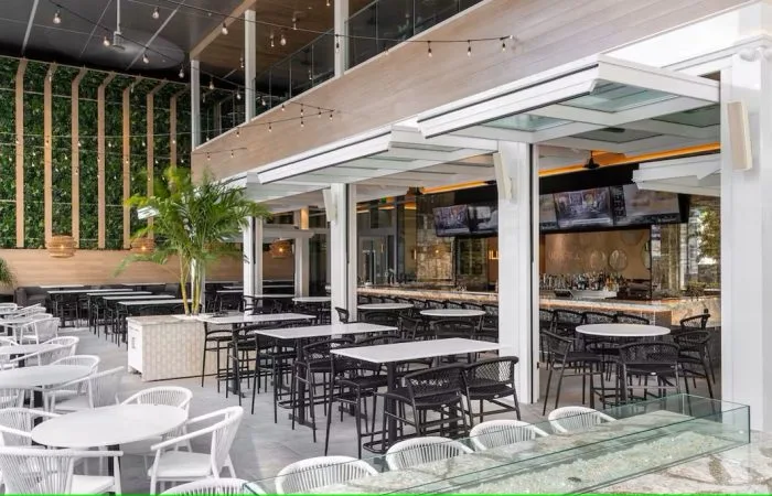 Crown 50/50 hybrid bi-fold overhead door on a restaurant
