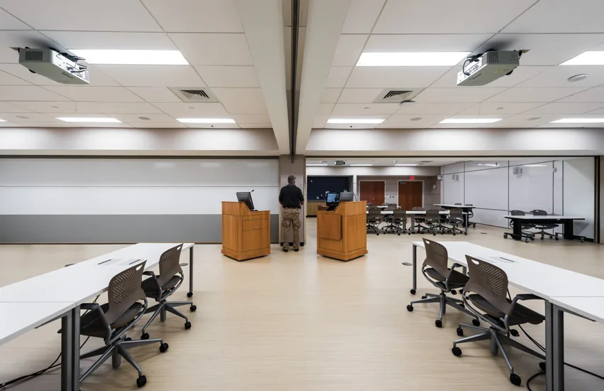 Training room with an Airwall vertical lift partition raised into the ceiling
