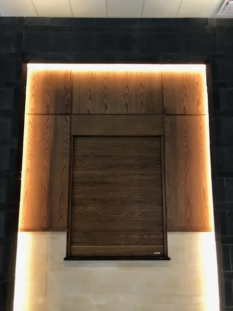 Woodfold roll-up door in a theatre